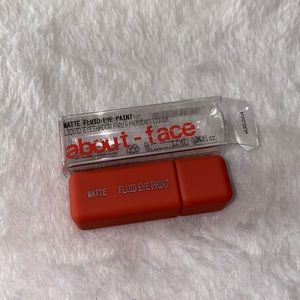 About Face matte fluid eye paint (marigold)